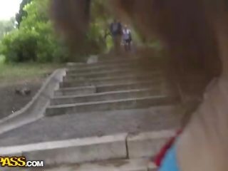 Young enchantress movs her tits in a public streets vid